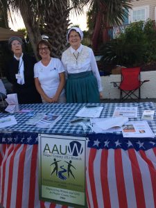 Linda Russell as Susan B. Anthony and Gail Palmer as Lucretia Mott flank Co-President Susie Baird.