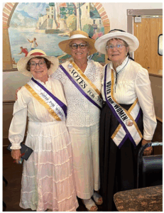 Susie Baird, Kathy Reichard-Ellavsky and Gail Palmer dressed in period costumes.